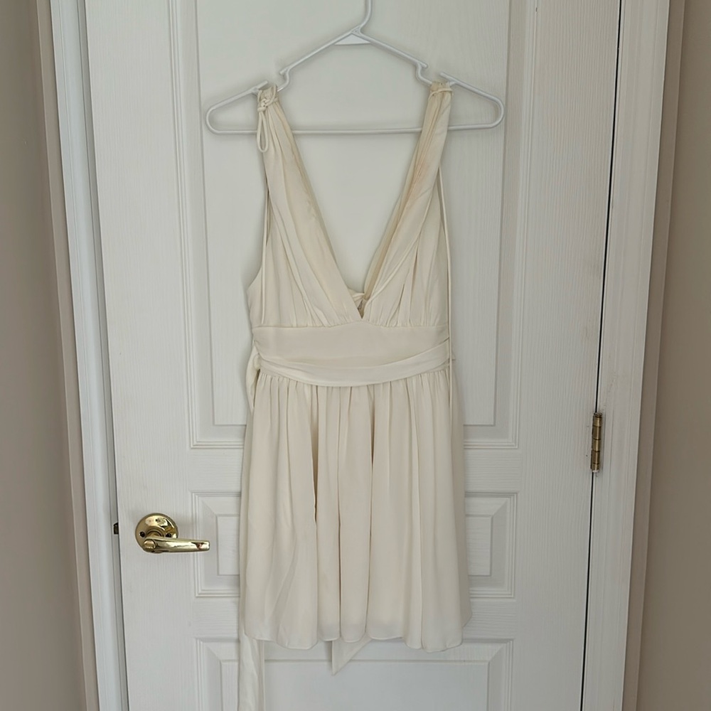 White deep v neck mini dress
